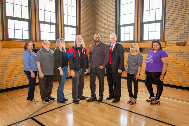 Blue Cross Complete of Michigan's Member Advisory Council standing in gymnasium