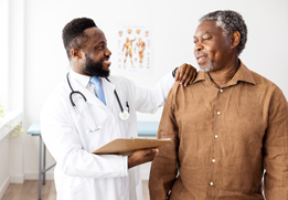 A photo of a doctor talking to a patient
