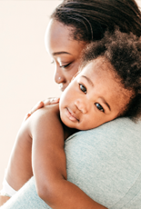  A mother holds her baby