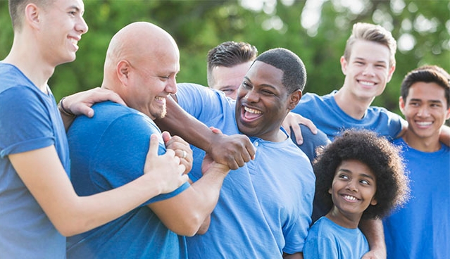 Men congratulating each other during an outing