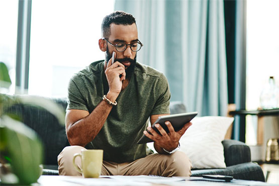 man reads information from a tablet