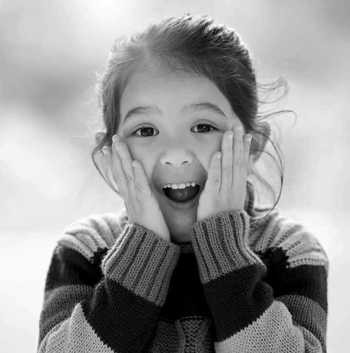 Young girl looks surprised